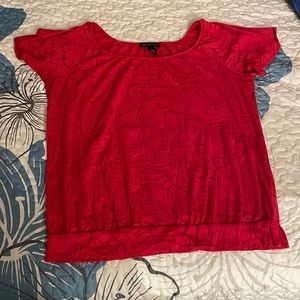 Red shortsleeved top